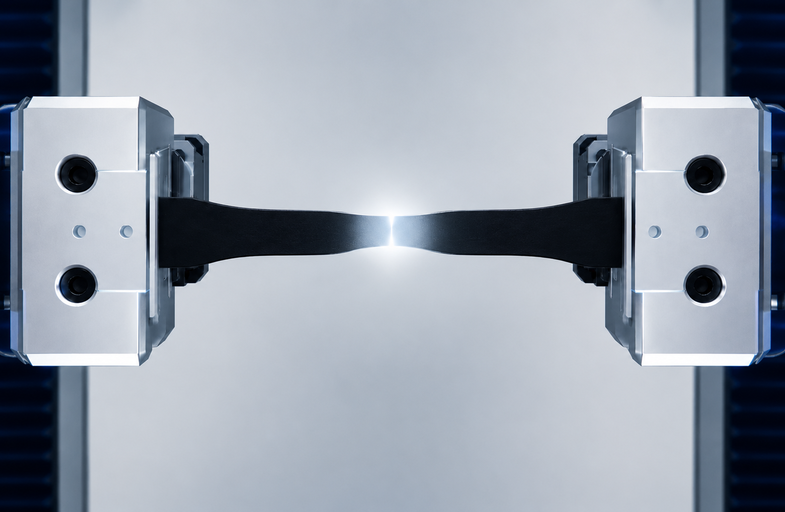Tensile testing of a polymer specimen in polymer mechanical testing