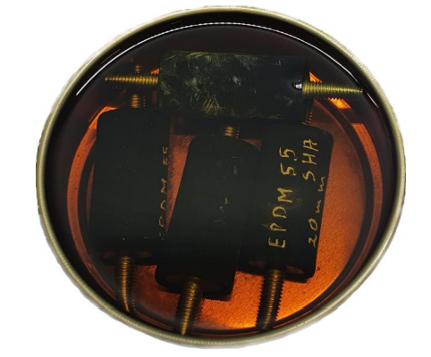 A round container with black objects in itAI-generated content may be incorrect.